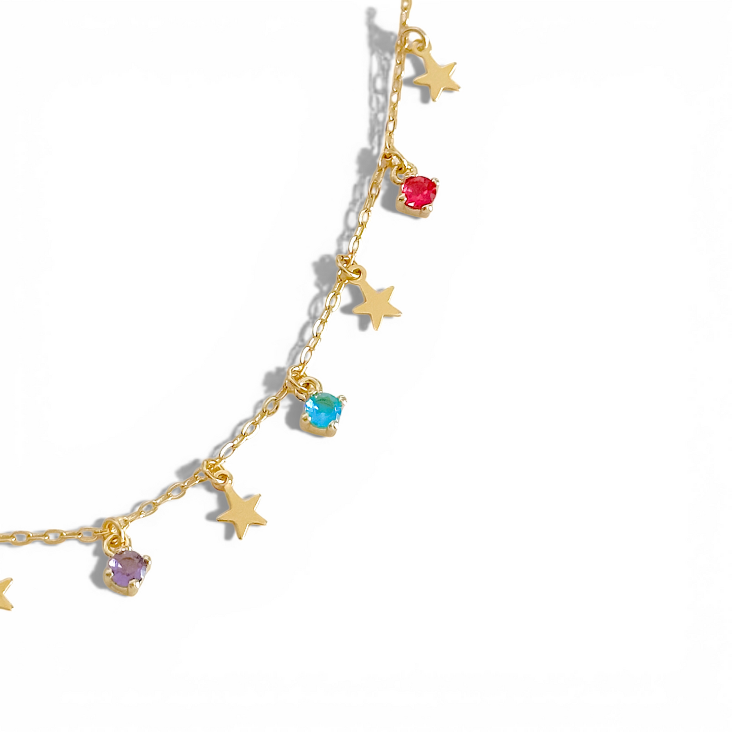 Cadena Corta mini estrellas y puntos de luz multicolor, enchapada en oro 18k Hipoalergénica.