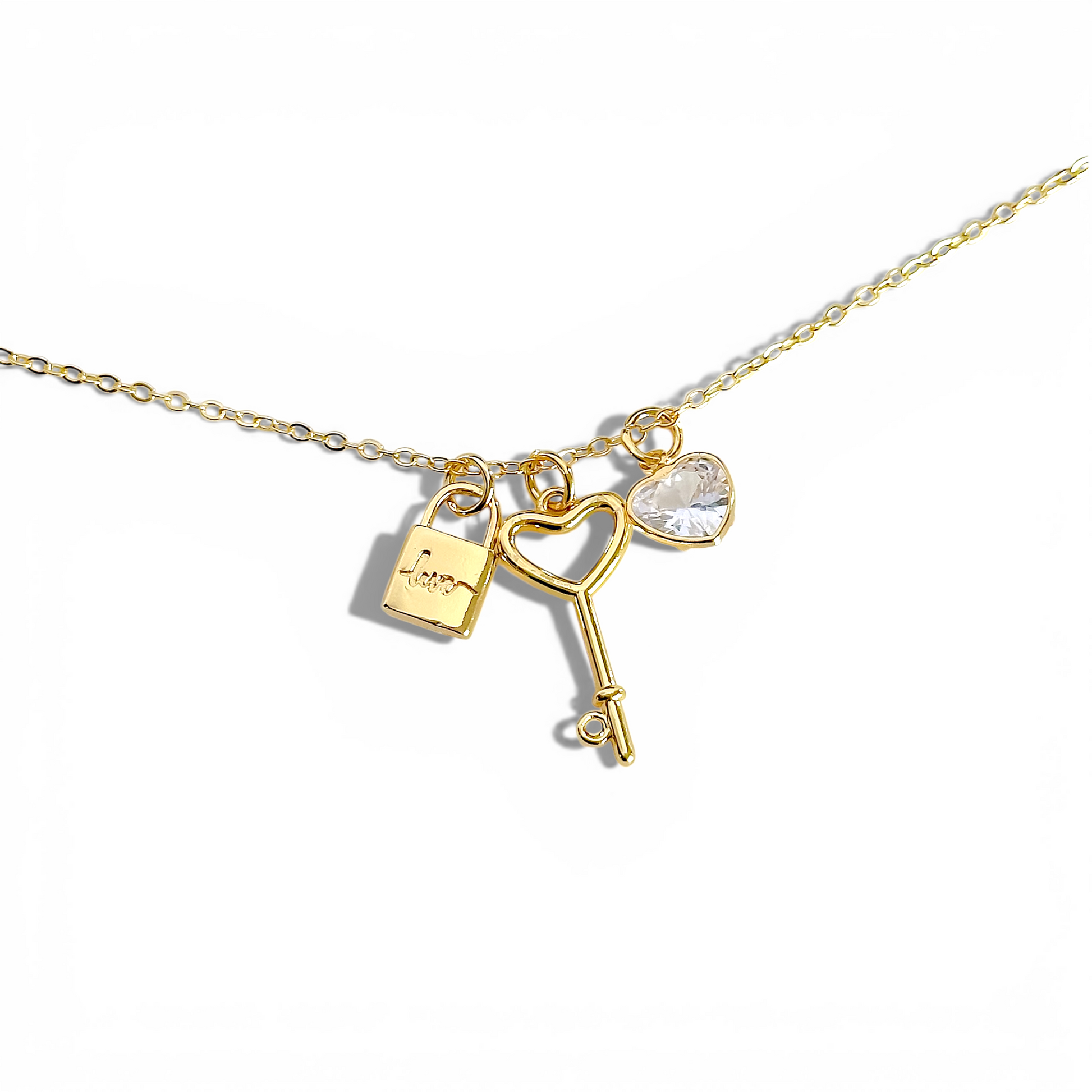 Cadena charms candado llave y corazón enchapada en oro 18K hipoalergénica - D'march Designs Chile
